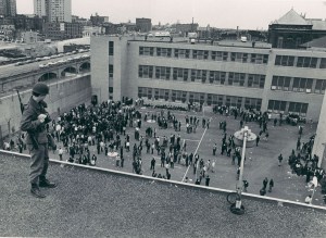 A National Guardsman watches detainees in the Baltimore city jail on April 10, 1968, six days after Martin Luther King Jr.’s assassination. (Weyman Swagger/Baltimore Sun)